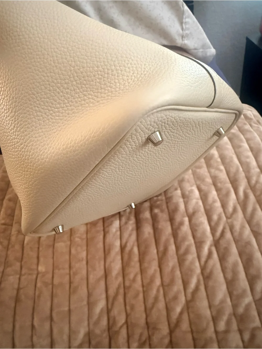 Leather bucket bag with charm